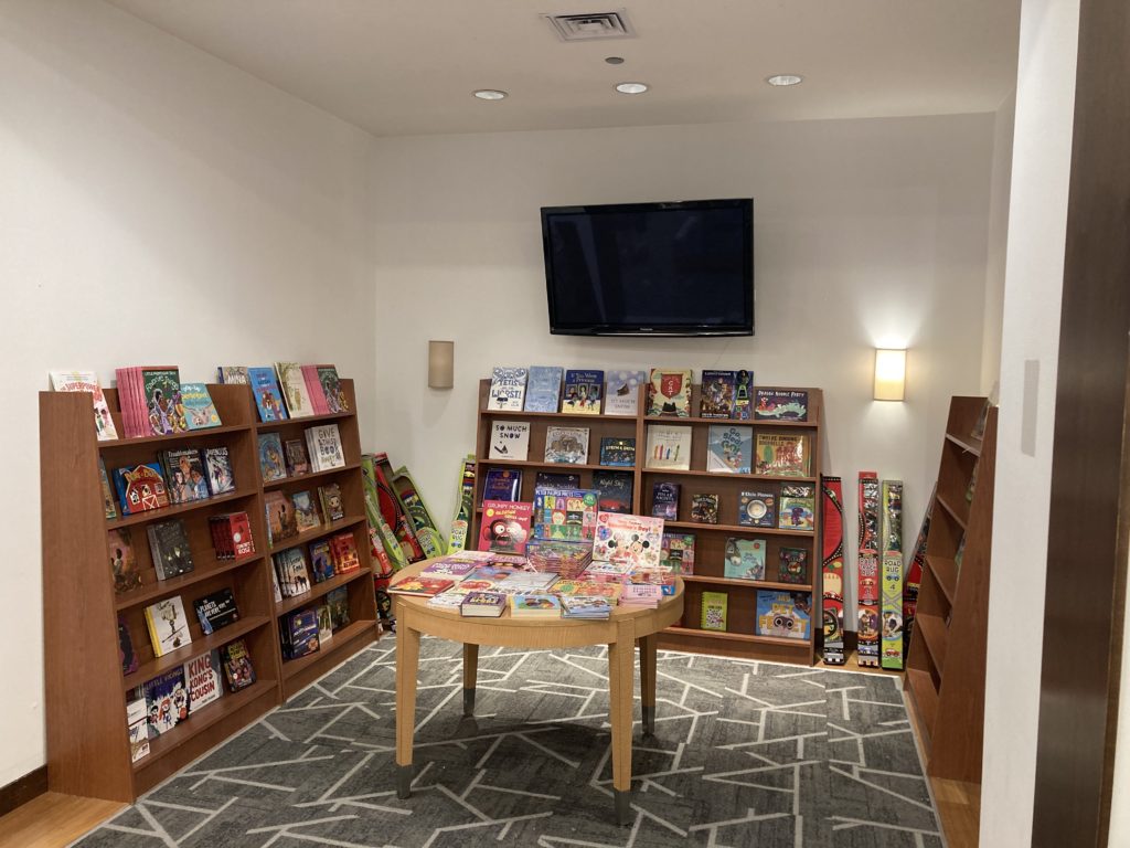 A photo of some shelves with children's books available for purchase.